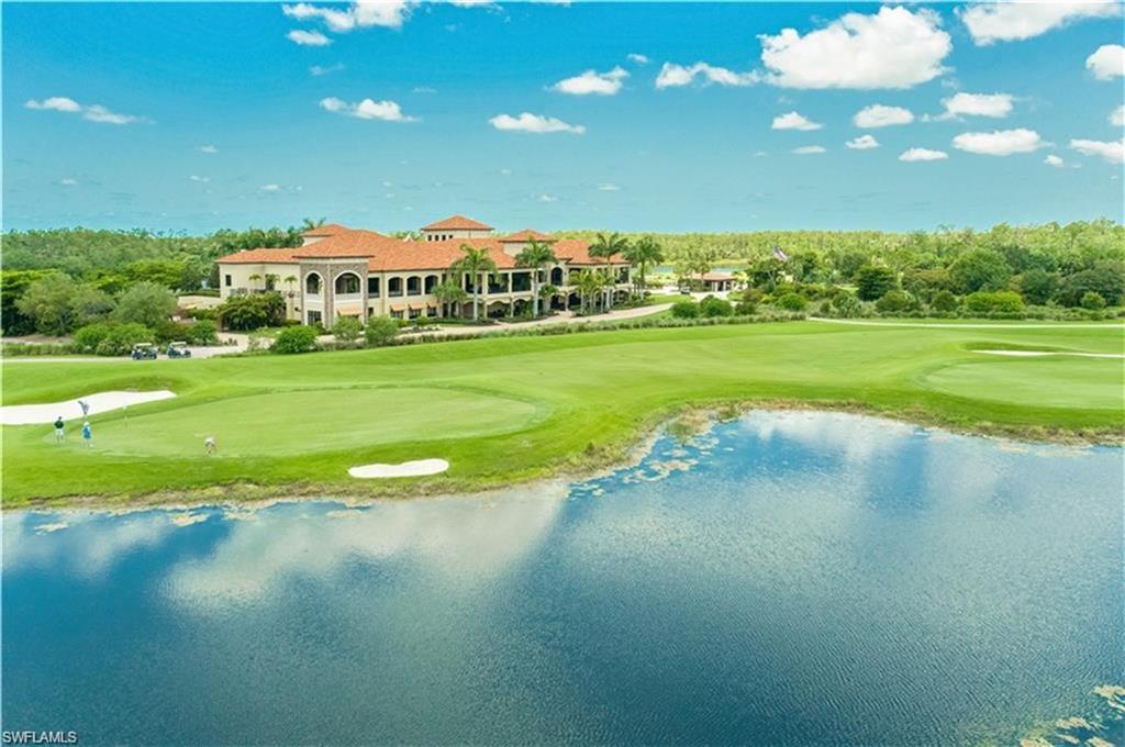 9560 Trevi Court, Unit 4811 Naples, FL 34113 - Photo 39 of 40 a view of a green field
