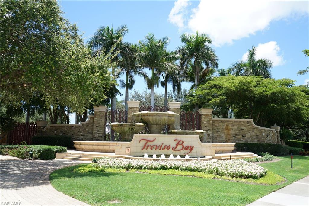 9560 Trevi Court, Unit 4811 Naples, FL 34113 - Photo 40 of 40 a garden view with a fountain