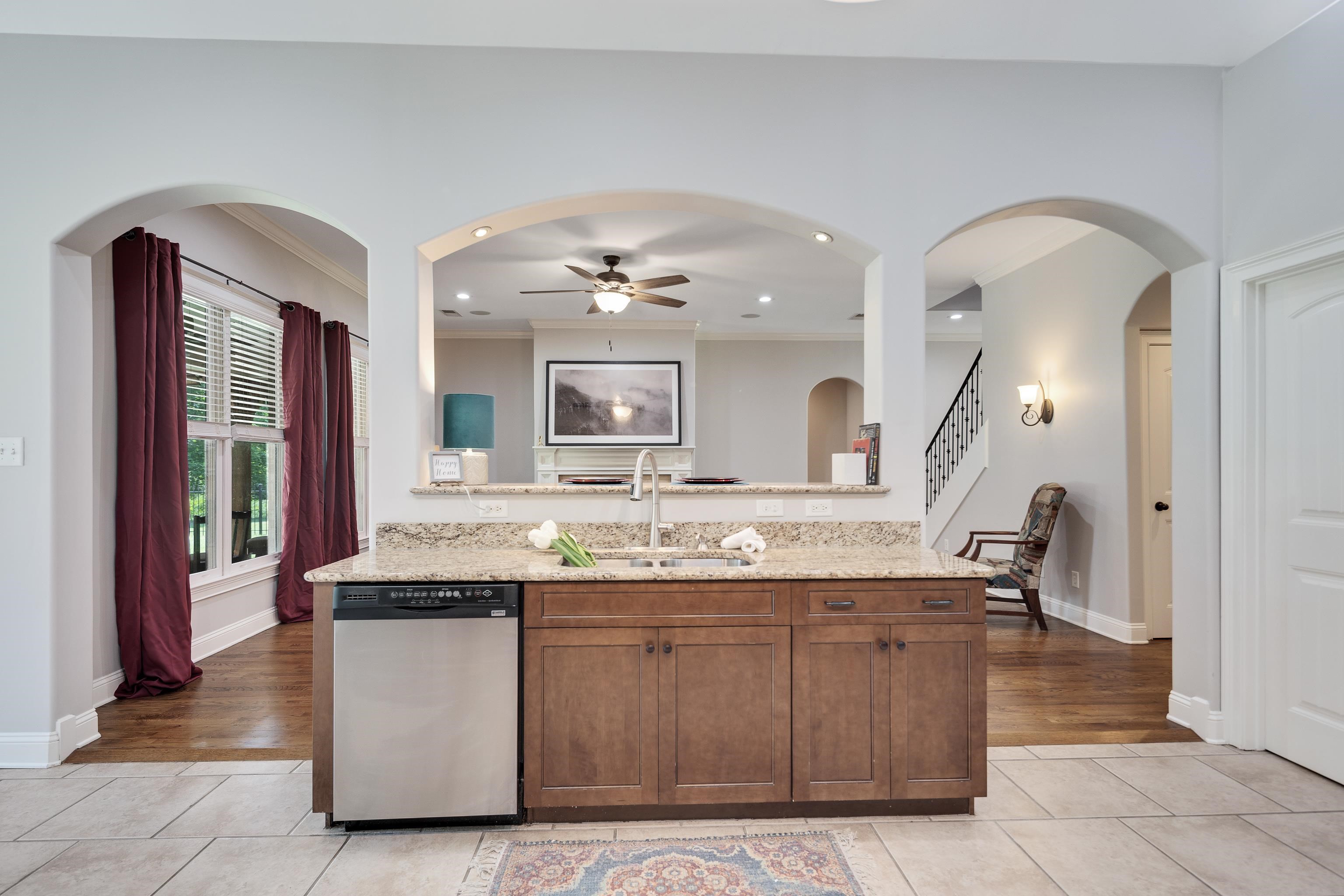 9028 Osborntown Road Arlington, TN 38002 - Photo 13 of 40 a spacious bathroom with a granite countertop sink a mirror and shower