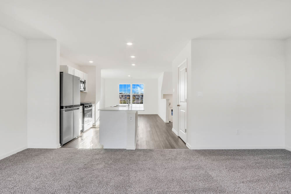 1555 Sequoia Way Pingree Grove, IL 60140 - Photo 12 of 51 a view of kitchen and hall with wooden floor