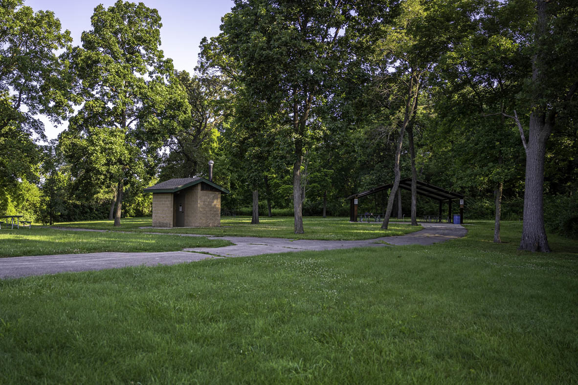 1555 Sequoia Way Pingree Grove, IL 60140 - Photo 36 of 51 a view of a wooden house with a big yard and large trees