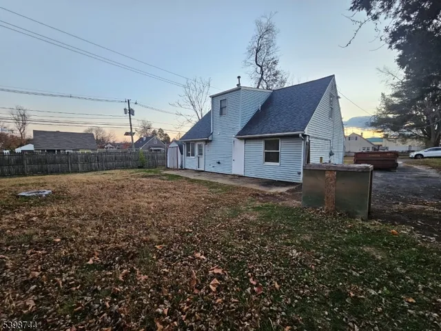 a house view with a garden space