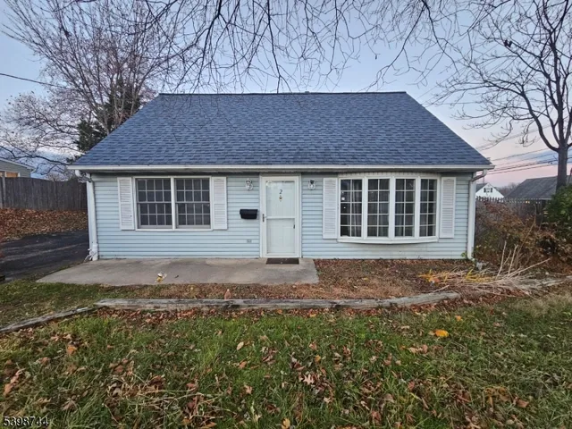 a house with trees in the background