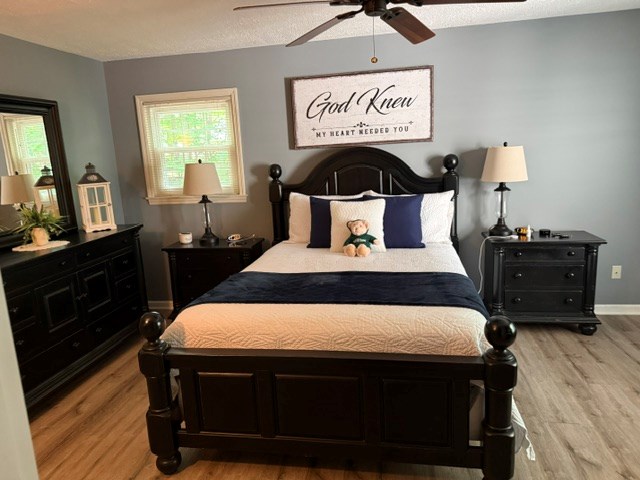 2948 Hendriske Road Young Harris, GA 30582 - Photo 16 of 20 a bedroom with a bed and a dresser