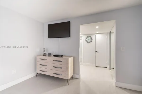 a view of room with flat screen tv