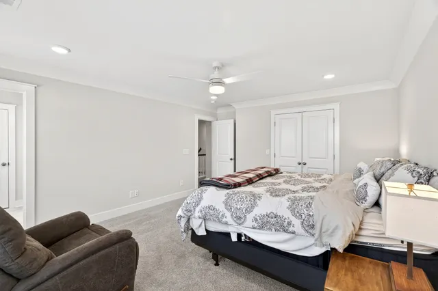 a en suite bathroom with double sink a mirror and a shower