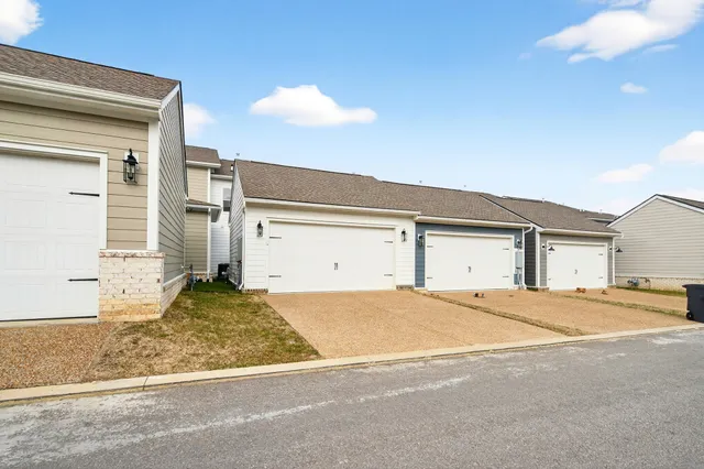 a view of garage and yard