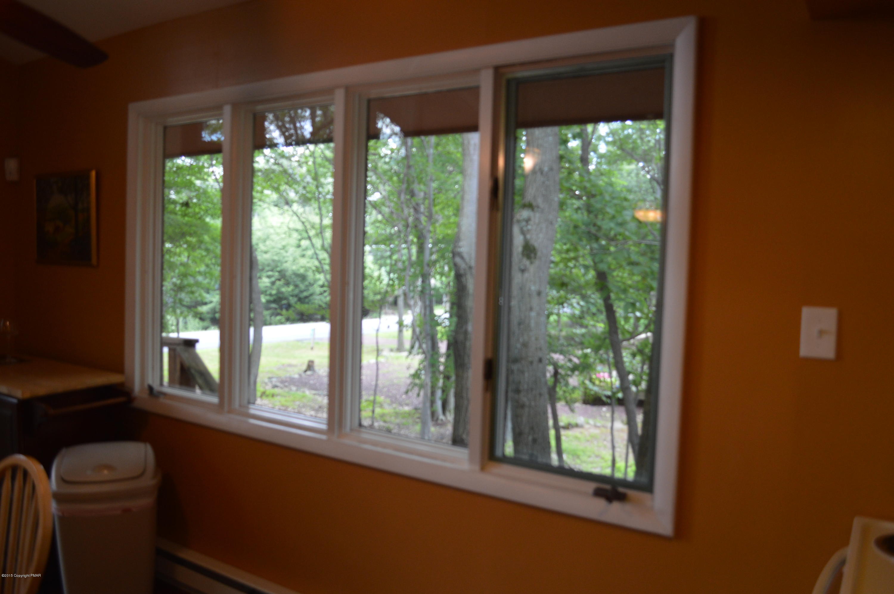 180 Brier Crest Road Blakeslee, PA 18610 - Photo 8 of 32 Lots of Glass in Dining Area