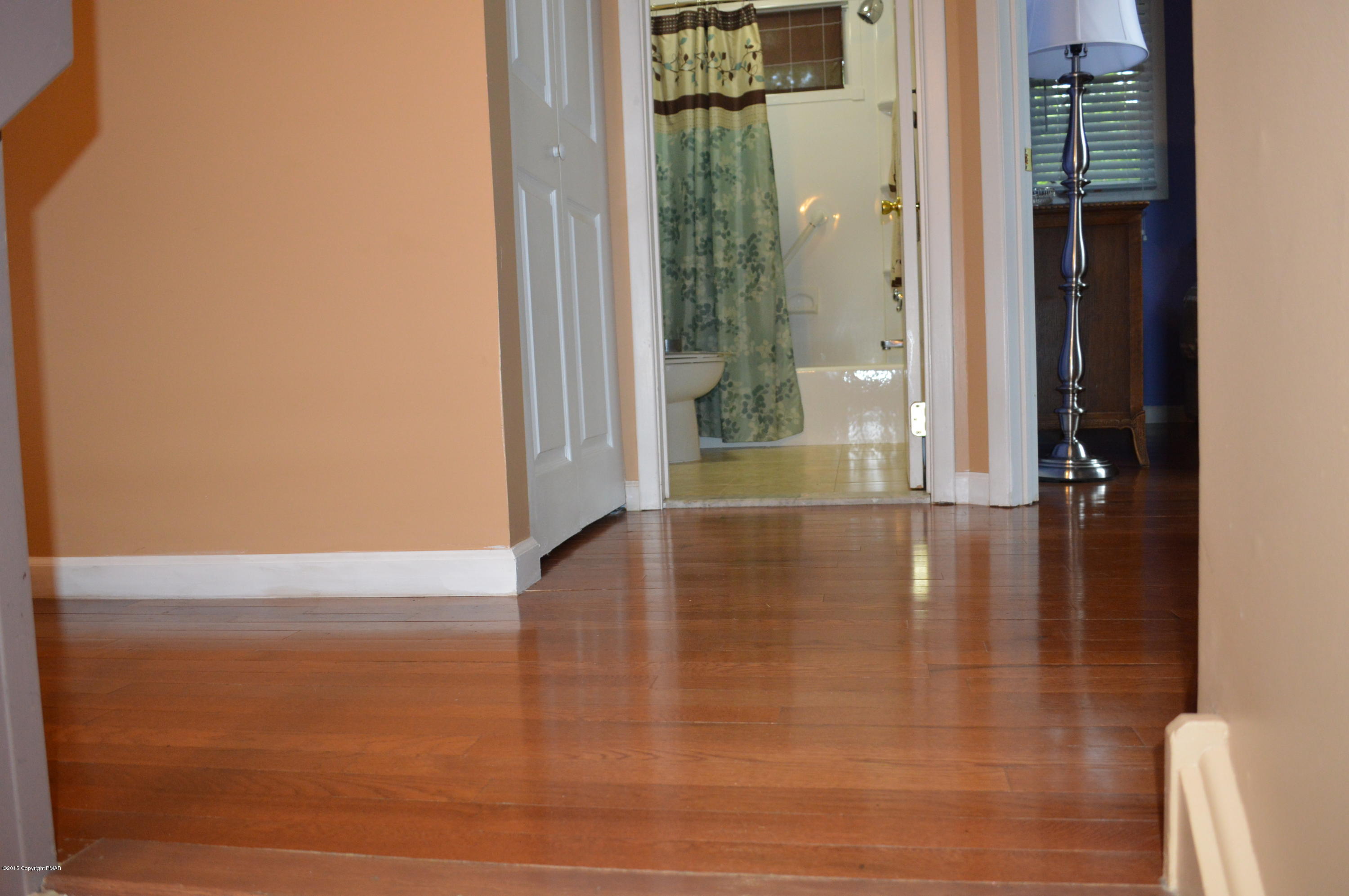 180 Brier Crest Road Blakeslee, PA 18610 - Photo 9 of 32 Real Hardwood Flooring main level