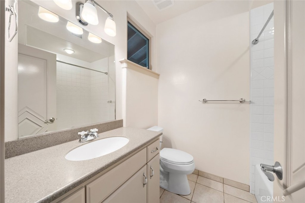 5840 Rocky Canyon Road Atascadero, CA 93422 - Photo 38 of 74 a bathroom with a sink toilet and vanity