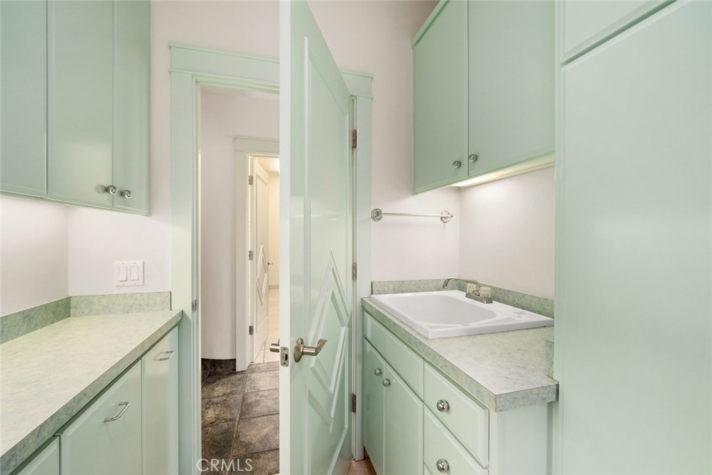 5840 Rocky Canyon Road Atascadero, CA 93422 - Photo 47 of 74 a bathroom with a granite countertop sink and a mirror
