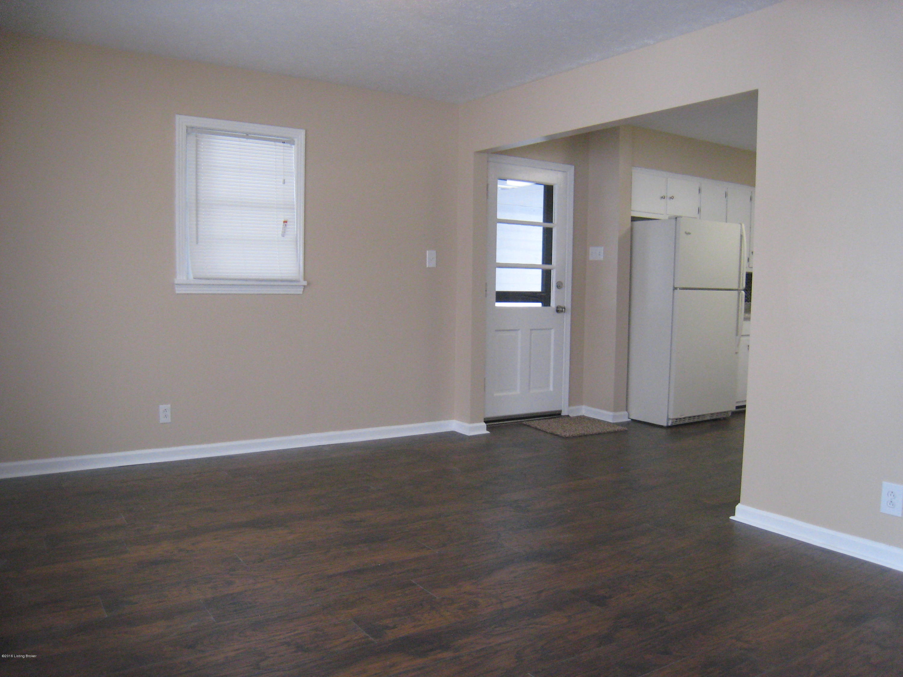 4809 Goepper Road Louisville, KY 40258 - Photo 12 of 23 Could be living or dining room. Open to kitchen.