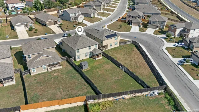 an aerial view of a backyard