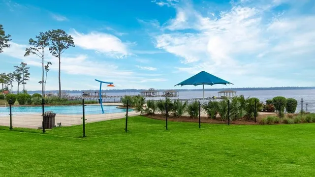 an aerial view of a house with a garden