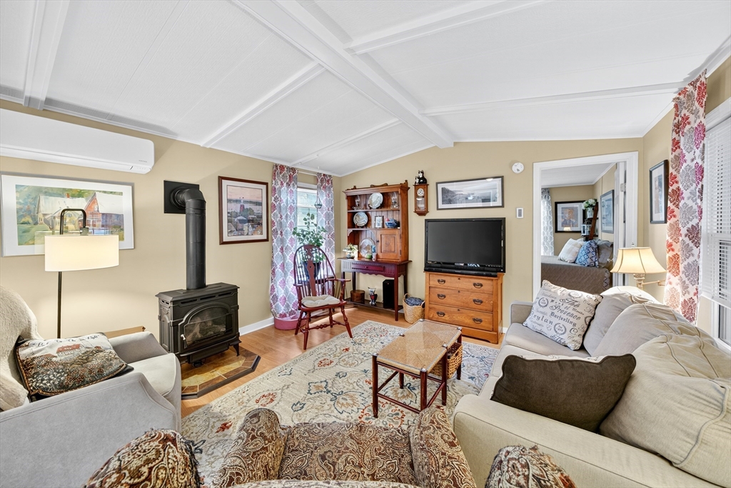 32 Windswept Road Wareham, MA 02576 - Photo 11 of 39 a living room with furniture and a flat screen tv