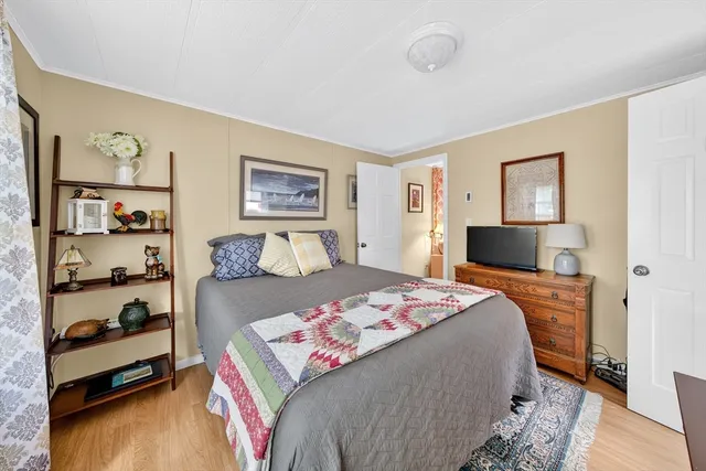 a bedroom with a bed and closet