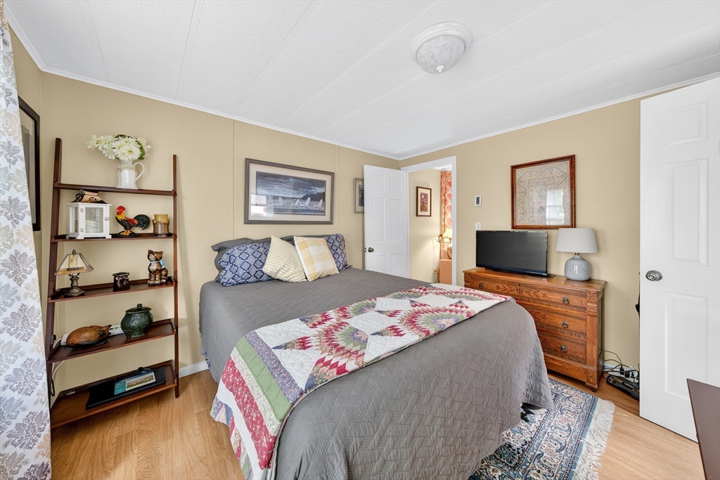 32 Windswept Road Wareham, MA 02576 - Photo 14 of 39 a bedroom with a bed and closet