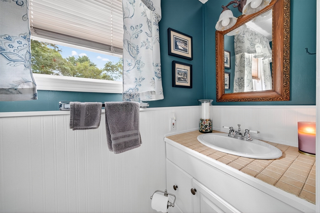 32 Windswept Road Wareham, MA 02576 - Photo 15 of 39 a bathroom with a sink and a mirror