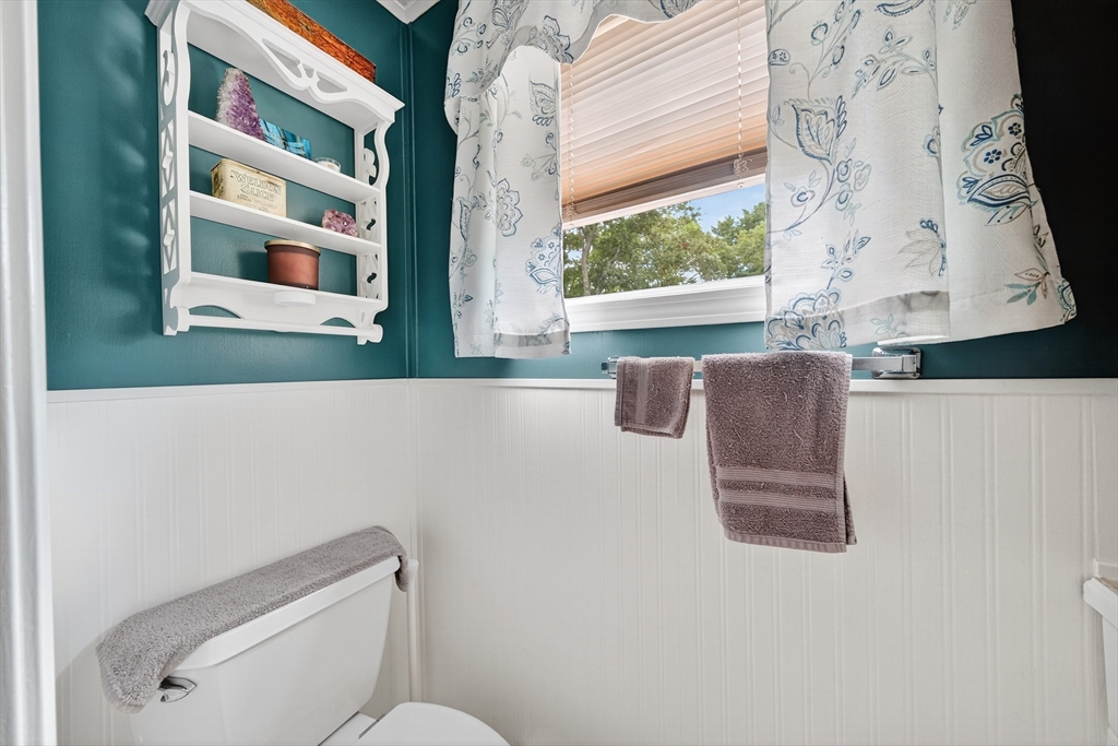 32 Windswept Road Wareham, MA 02576 - Photo 16 of 39 a white toilet sitting next to a window
