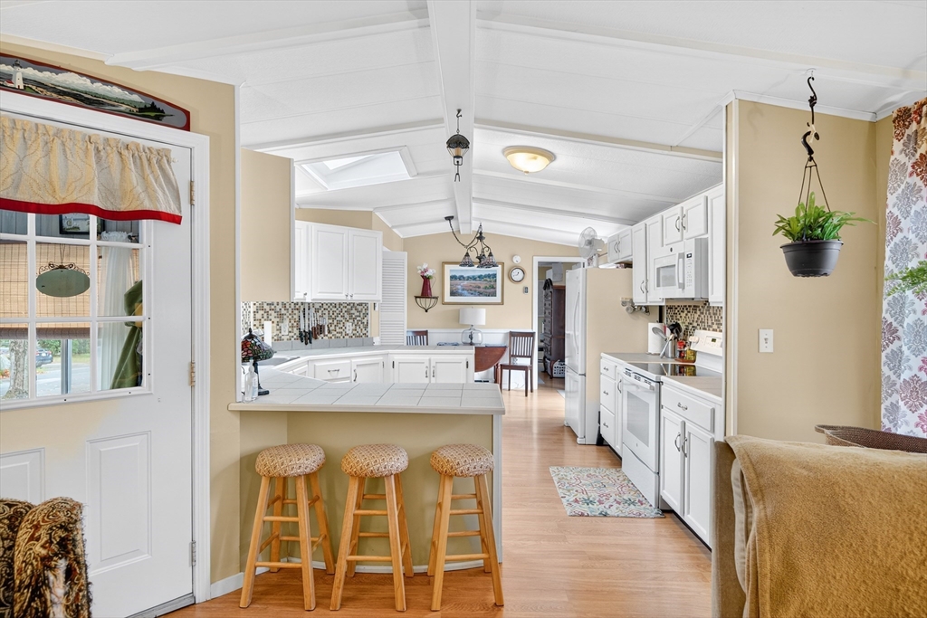 32 Windswept Road Wareham, MA 02576 - Photo 17 of 39 a view of a kitchen and dining room
