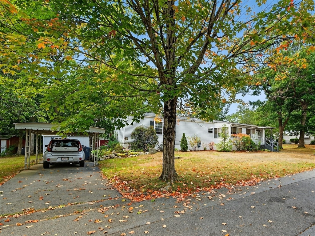 32 Windswept Road Wareham, MA 02576 - Photo 2 of 39 a front view of a house with a yard