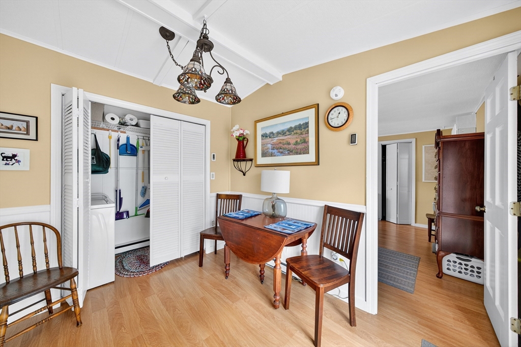 32 Windswept Road Wareham, MA 02576 - Photo 21 of 39 a view of a livingroom with furniture and a dining table