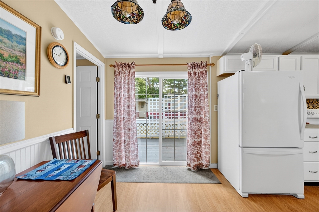 32 Windswept Road Wareham, MA 02576 - Photo 24 of 39 a kitchen with a refrigerator and a stove