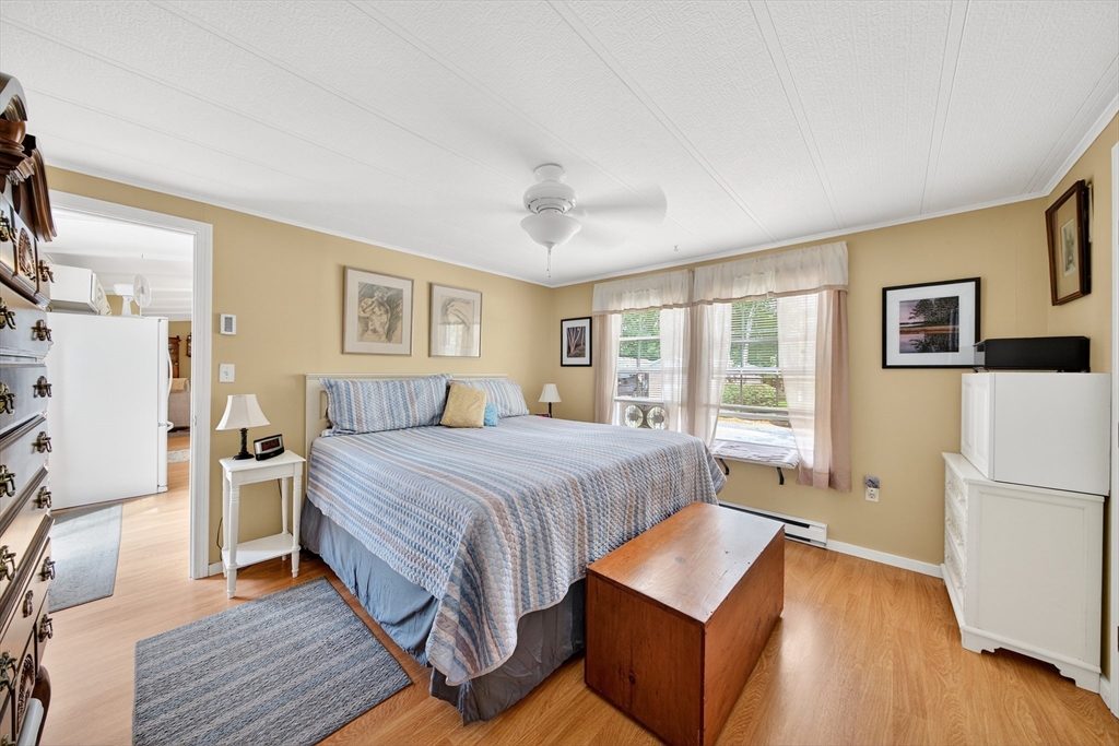 32 Windswept Road Wareham, MA 02576 - Photo 26 of 39 a bed room with a bed and a window