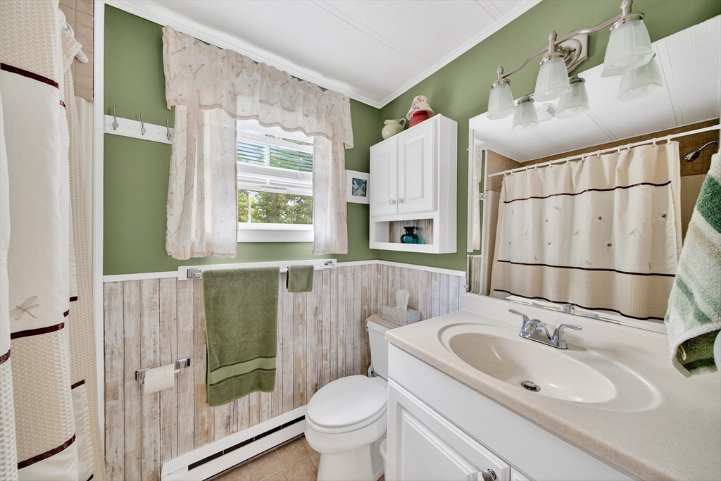 32 Windswept Road Wareham, MA 02576 - Photo 27 of 39 a bathroom with a sink toilet and shower