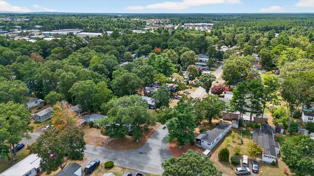 an aerial view of a town with houses