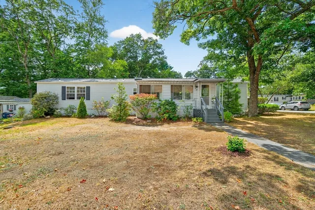 a house with trees in front of it