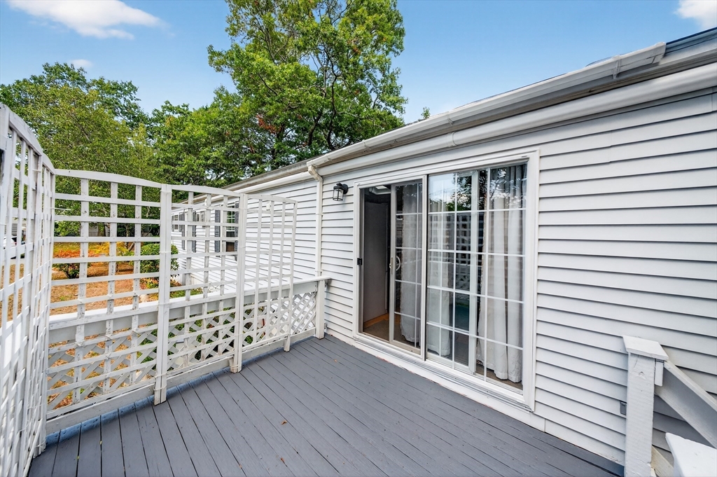 32 Windswept Road Wareham, MA 02576 - Photo 7 of 39 a view of a porch with wooden floor