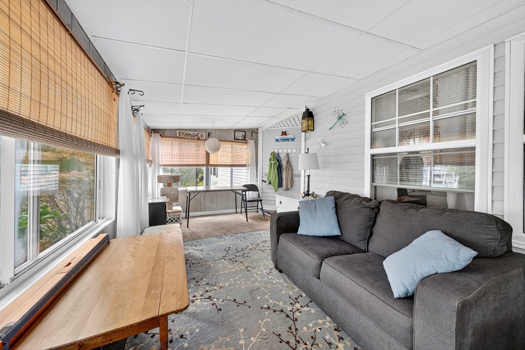 32 Windswept Road Wareham, MA 02576 - Photo 8 of 39 a living room with furniture and a large window