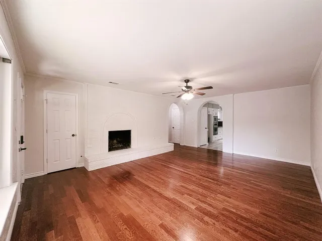 a view of gallery with wooden floor