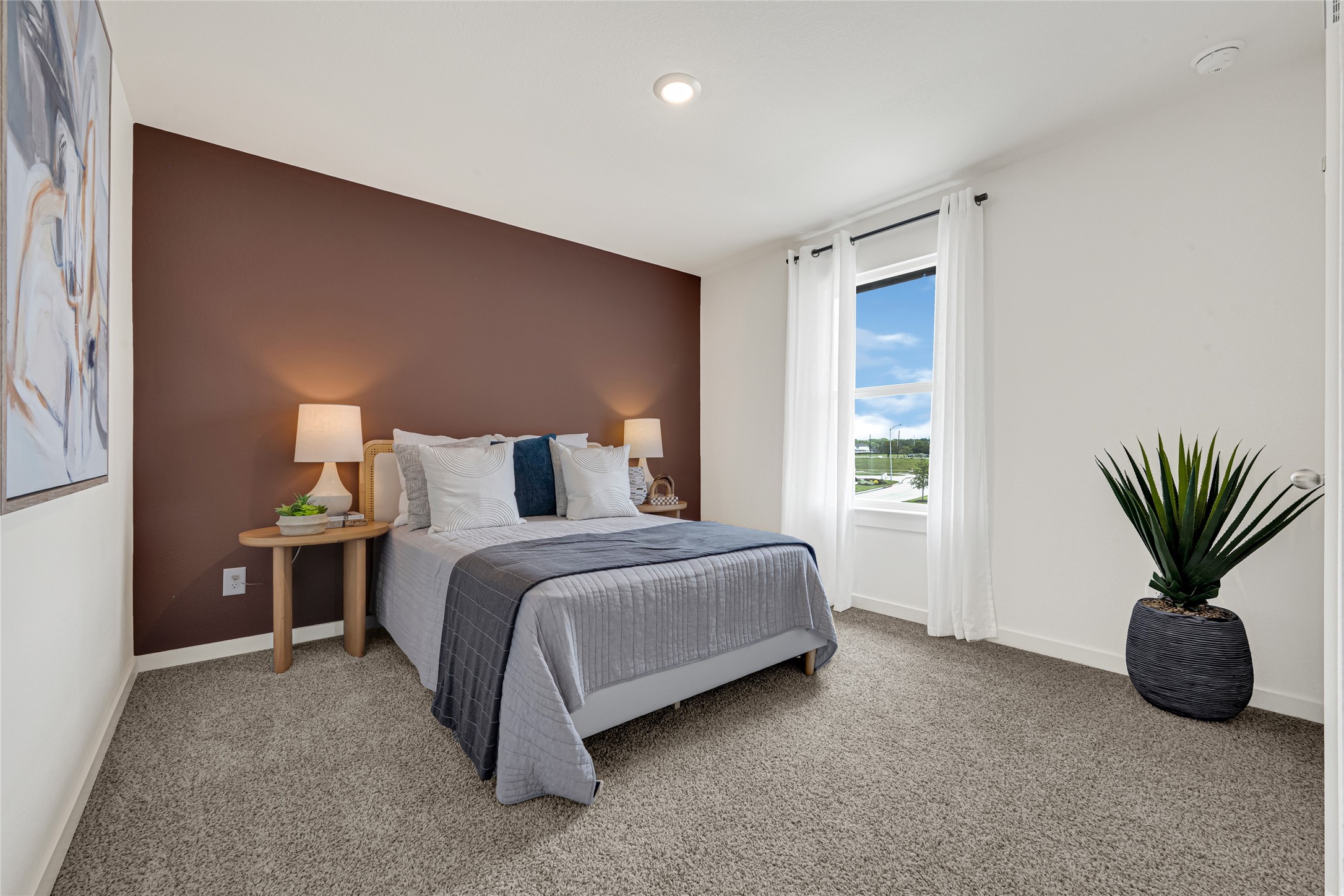 6204 Brookhaven Street Rosenberg, TX 77469 - Photo 24 of 33 a bed room with a bed and a window