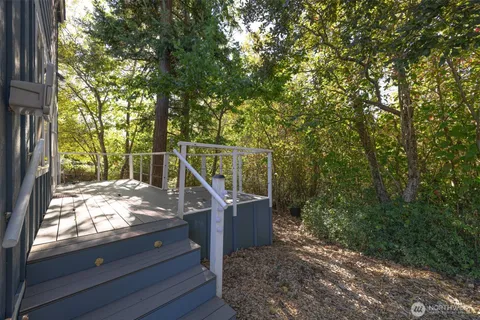 a view of a deck with a trees