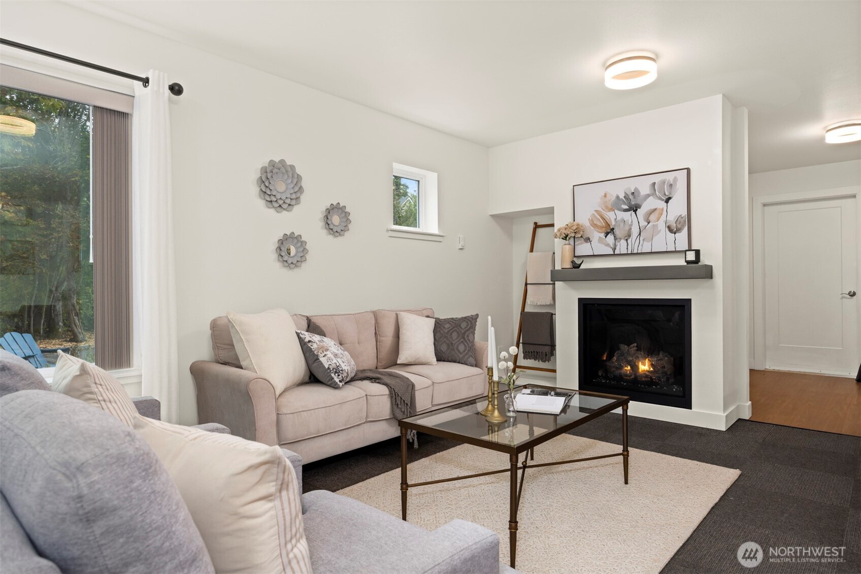 1416 32nd Street Bellingham, WA 98225 - Photo 15 of 37 a living room with furniture and a fireplace
