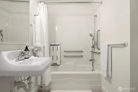 a bathroom with a sink and a bathtub