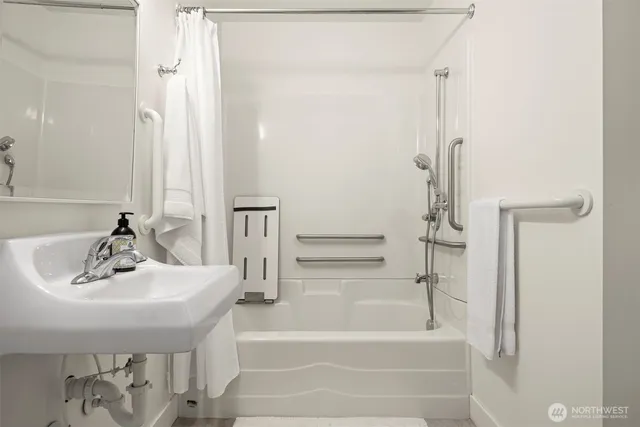 a bathroom with a sink and a bathtub