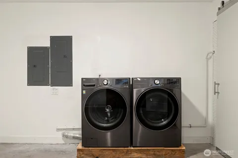 a utility room with dryer and washer