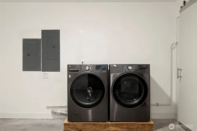 a utility room with dryer and washer