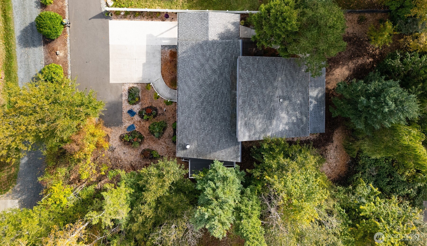 1416 32nd Street Bellingham, WA 98225 - Photo 37 of 37 an aerial view of residential house with outdoor space and trees all around