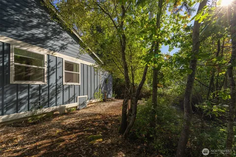 a backyard of a house with seating space