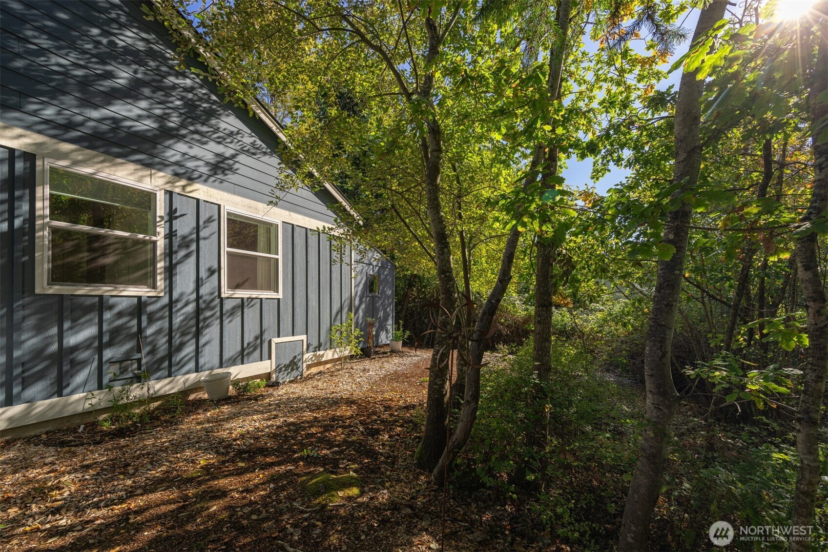 1416 32nd Street Bellingham, WA 98225 - Photo 7 of 37 a backyard of a house with seating space