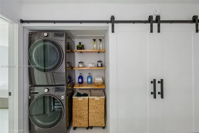 a utility room with dryer and washer