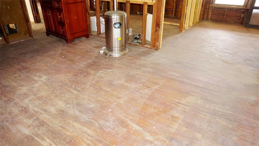 9701 James Avenue Tyler, TX 75706 - Photo 13 of 14 a view of an empty room with wooden floor