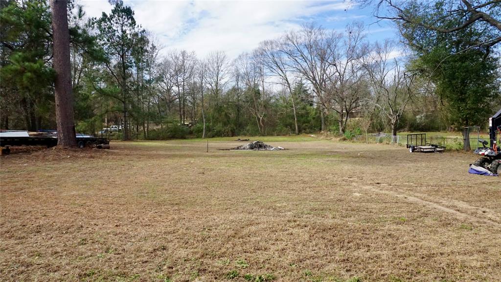 9701 James Avenue Tyler, TX 75706 - Photo 6 of 14 a view of outdoor space with trees