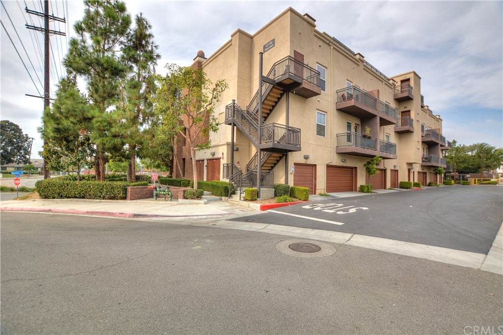369 Town Court Fullerton, CA 92832 - Photo 1 of 1 front view of a building with a street