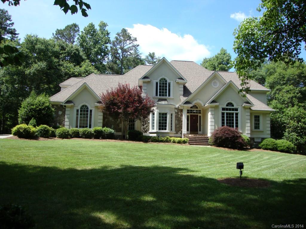 2405 New Salem Road Monroe, NC 28110 - Photo 1 of 20 a front view of a house with a yard and garage