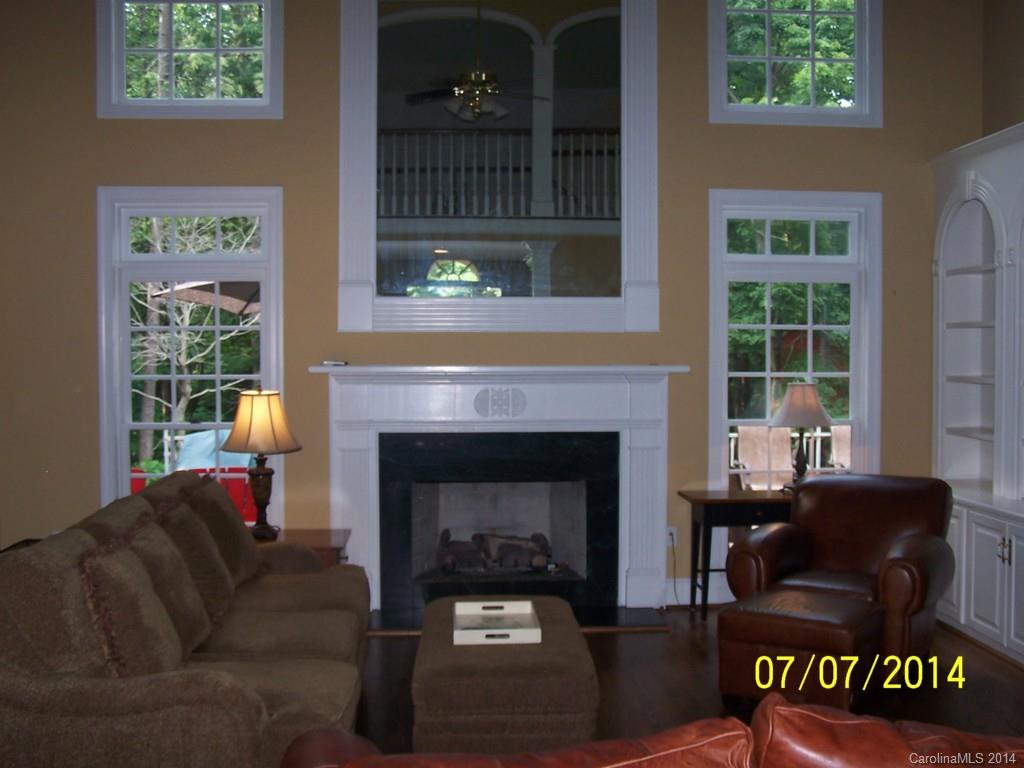 2405 New Salem Road Monroe, NC 28110 - Photo 2 of 20 a living room with furniture and a fireplace